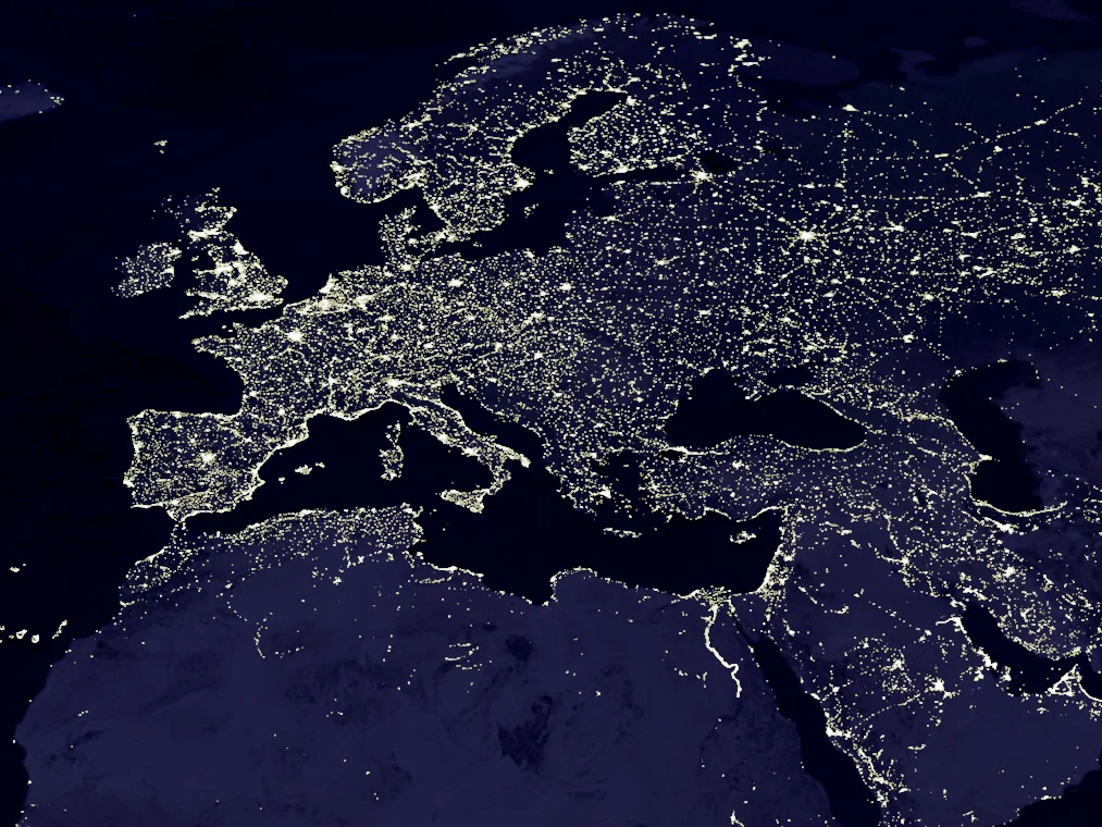 Europe at night from space — city lights across the delivery map