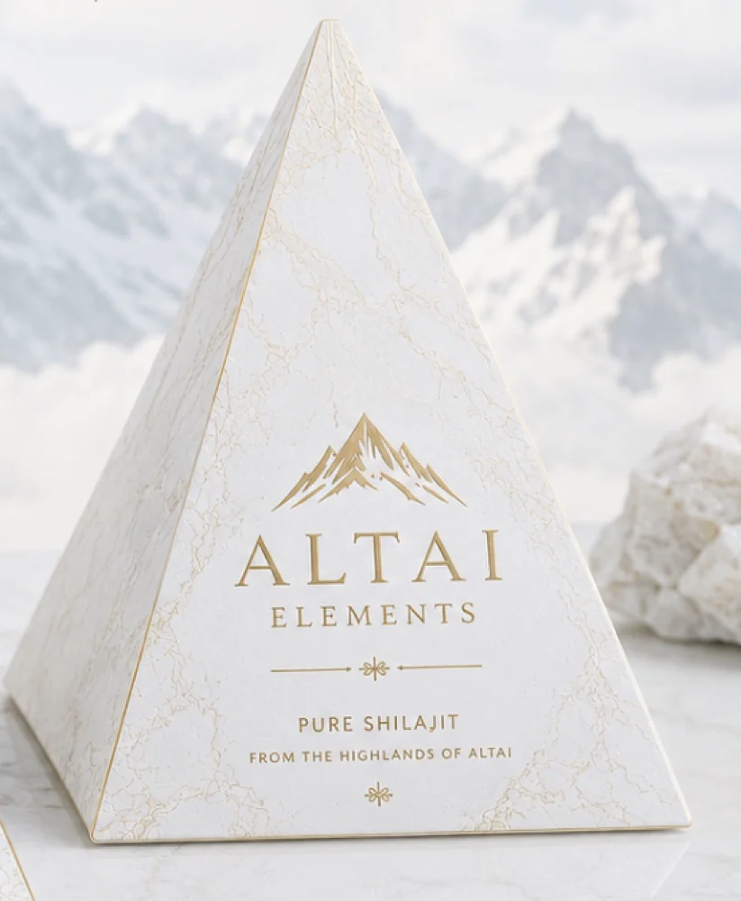 Open white pyramid box revealing the shilajit pot